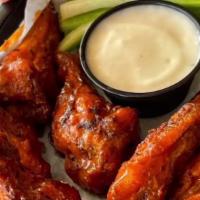 Buffalo Wings · Authentic buffalo, New York style wings, large, juicy with a classic buffalo sauce.