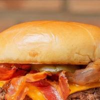 Manhattan'S Cheeseburger · Cheese, bacon, fries, and soda.