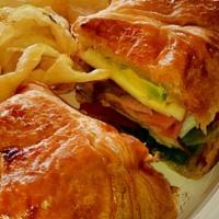 Join The Club · Toasted croissant with turkey, ham, Muenster cheese, tomato, avocado, bacon, greens, and cil...