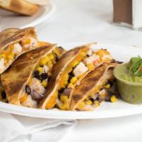 Orale Quesadilla · Chicken, orale mix (includes tomatoes, cilantro, onions, corn, and black beans) shredded che...