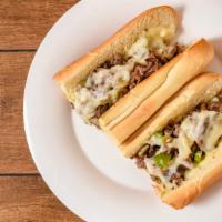 Philly Steak And Cheese Sub · Green peppers, mushrooms, onions, and provolone cheese.
