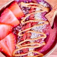 Super Berry · Açaí, berry mix, banana, almond butter, almond milk, topped with cocoa nibs, drizzle of almo...