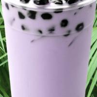 Taro Milk Tea · Rich tasting taro milk tea with a deep natural sweetness and a nutty flavor.