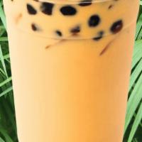 Mango Milk Tea · Creamy, refreshing mango milk tea with natural sweetness from fresh mangos.