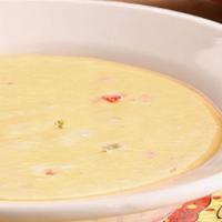 Chile Con Queso · Our signature, handcrafted and delicious creamy cheese dip.