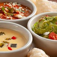 Abuelo'S Dip Sampler · A medley of our savory specialties, featuring our chile con queso, queso diablo, guacamole a...