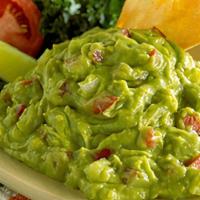 Guacamole · Hand-mashed whole avocados, seasoned to perfection with lime juice, onions and diced tomatoe...