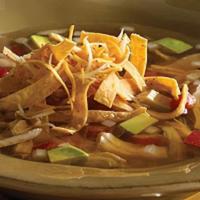 Tortilla Soup · A bowl of our savory blend of seasoned chicken and garden fresh vegetables. Served with a si...