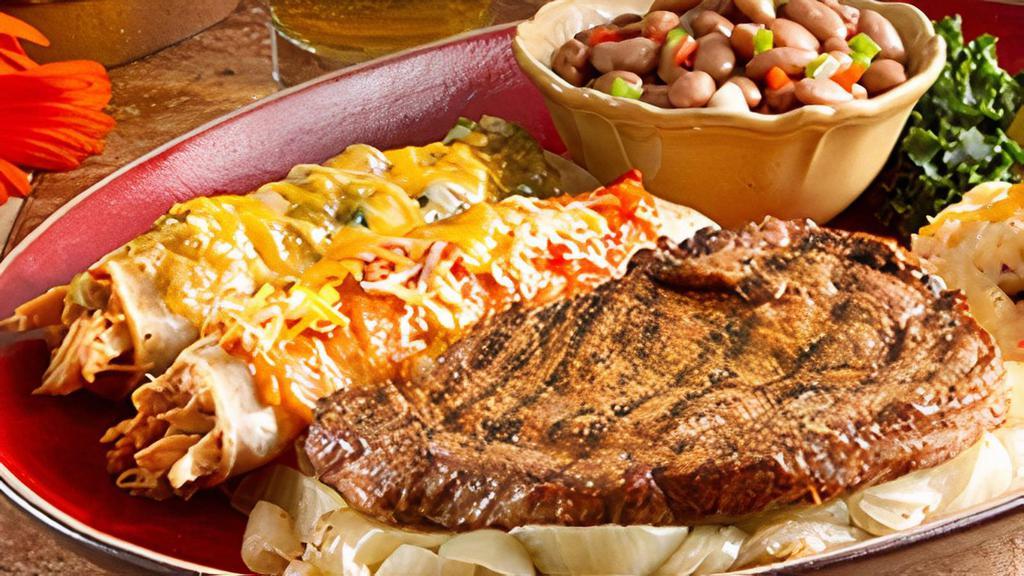 Steak And Enchiladas · Fire-grilled steak* cooked to order with your choice of two hand-rolled enchiladas. Served with charro beans and Papas con Chile™.