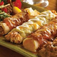 Juarez · Crispy beef taco, tamale, sour cream chicken and cheese hand-rolled enchiladas.  Served with...