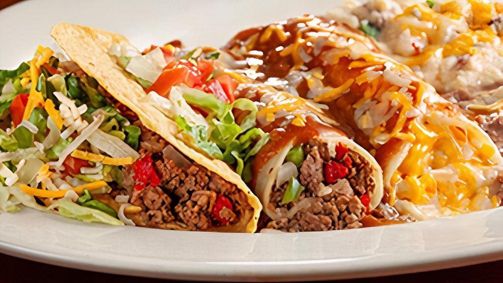 Laredo · Hand-rolled beef enchilada, cheese enchilada and a crispy beef taco served with refried beans and your choice of Papas con Chile™ or Mexican rice.