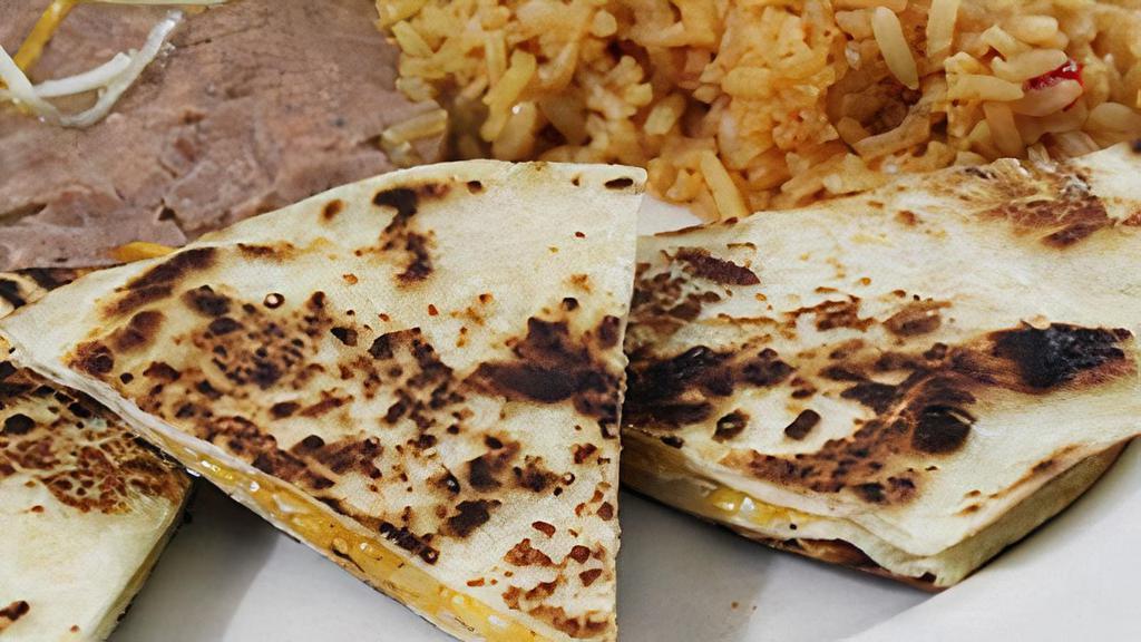 Kid'S Cheese Quesadilla · A child's portion of a baked cheese quesadilla, served with French fries, or refried beans and Mexican rice.
