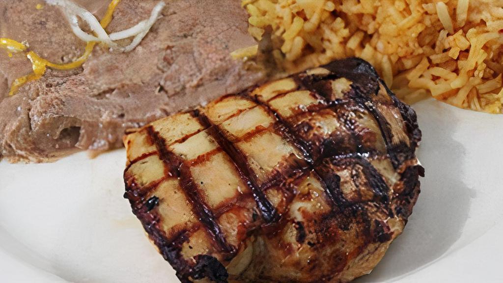 Kid'S Grilled Chicken · A child's portion of a grilled chicken breast, served with French fries, or refried beans and Mexican rice.