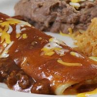 Kid'S Cheese Enchilada With Meat Sauce · A cheese enchilada topped with chile con carne and served with French fries, or refried bean...
