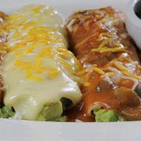 Vegetarian Enchiladas · Three avocado enchiladas topped with your choice of ranchera sauce or chile con queso. Serve...