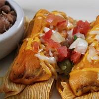 Gluten-Sensitive Tamale Plate · Three beef tamales topped with melted cheddar and Jack cheese and fresh pico de gallo. Serve...