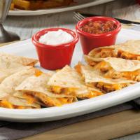 Chicken Quesadilla · Our chicken quesadilla is amazing. It has chicken, cheddar, sour cream and black beans.