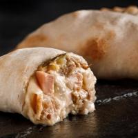 The Cuban · The most revolutionary of all our empanadas. You have to try it!
Pork, cheese, cooked ham, p...