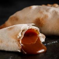 Banana Split  · Filled with caramelized banana and milk caramel. Ideal for dessert, and a favorite of childr...