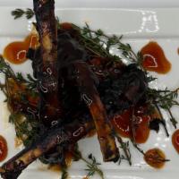 Canarsie Popsicles (Lamb Chops) · Grilled Lamb chops glazed with our island secret sauce.