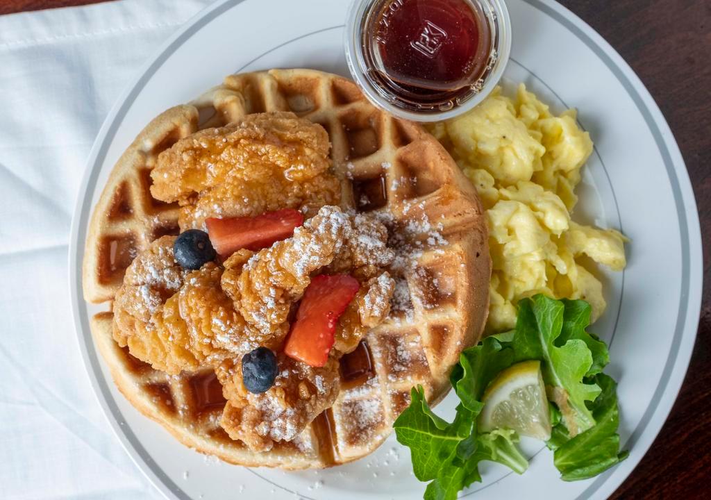 Chicken And Waffle · Belgian waffle, crispy chicken, and 2 scrambled eggs. Consuming raw or undercooked meats, poultry, seafood, shellfish, or eggs may increase your risk of foodborne illness.