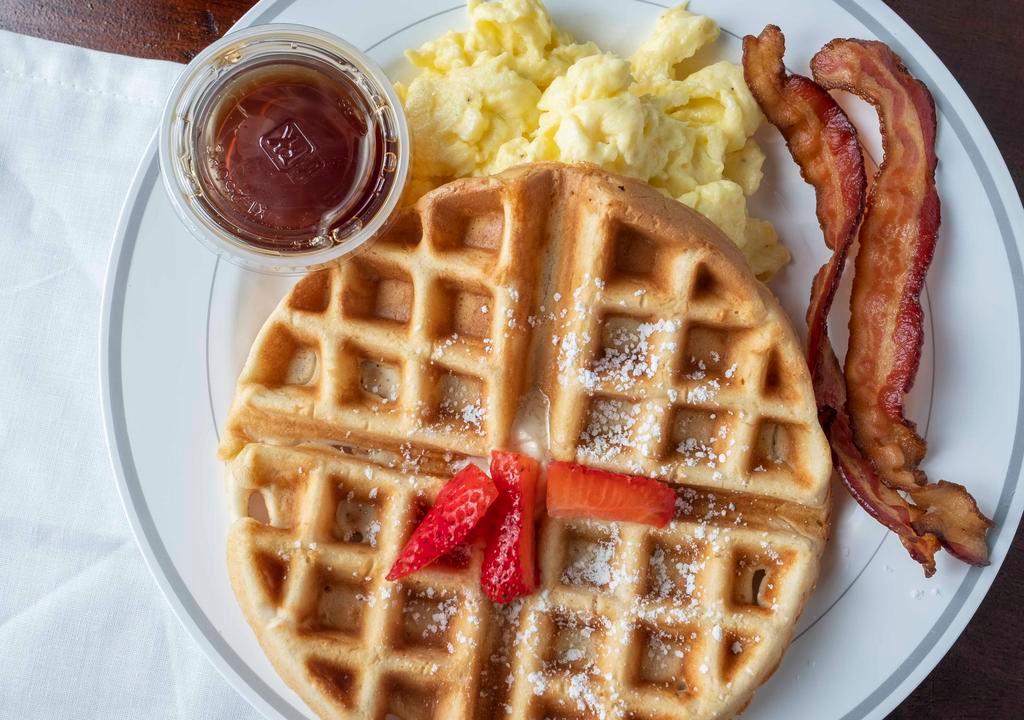 Waffle Breakfast · 1 Belgian waffle, 2 eggs, and choice of meat. Consuming raw or undercooked meats, poultry, seafood, shellfish, or eggs may increase your risk of foodborne illness.