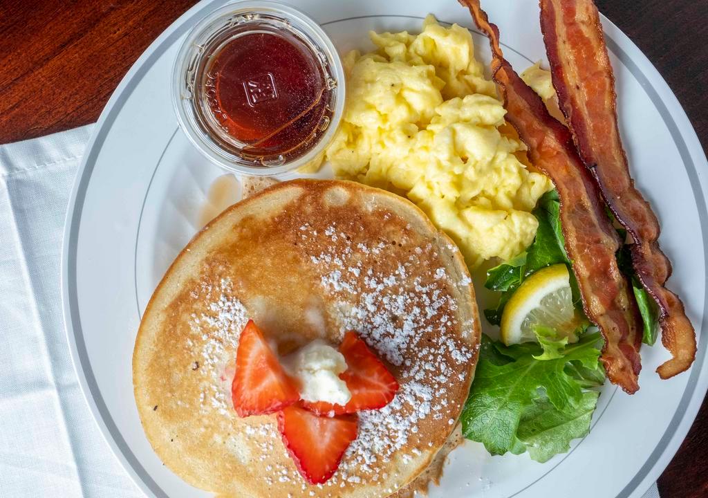 Pancake Breakfast · 2 pancakes, 2 eggs, and choice of meat. Consuming raw or undercooked meats, poultry, seafood, shellfish, or eggs may increase your risk of foodborne illness.