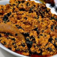 Egusi Soup · A delectable soup thickened with the grounded melon seeds and fried with palm oil