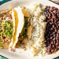 Gringo Style Taco Plate · 2 braised chicken or ground beef tacos with lettuce, shredded cheese and tomato. Choice of h...