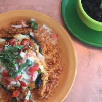 Chile Rellenos · Vegetarian. 2 Poblano pepper stuffed with rice and choice of beans, topped with queso, guaji...