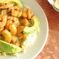 Camarones En Verde · Shrimp sauteed in salsa verde served over white rice with sliced avocado.
Includes choice of...