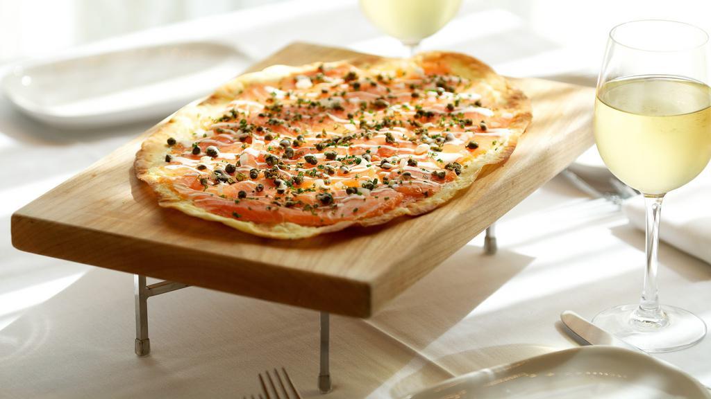 Smoked Salmon Tarte · Crème fraîche, minced red onion, capers.