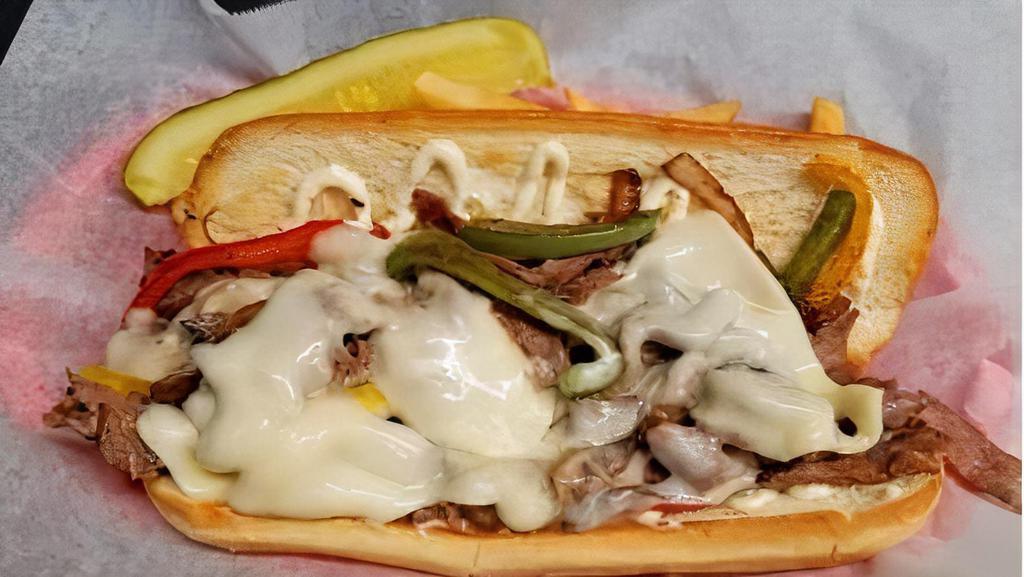 Philly Cheesesteak · Scrambled Eggs + Ribeye Steak + Green Peppers + Onions + Cheese Whiz - On A Hoagie Roll Or A Warm Tortilla