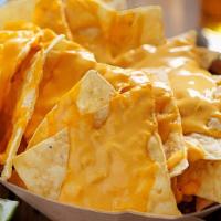 Regular Nachos · Chips & cheese.