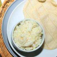 Pollo Rice · With chicken seasonings.