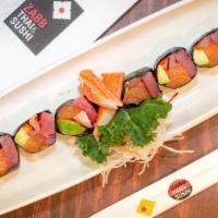 Wonder Roll (No Rice) · Salmon, tuna, and yellow tail wrapped together with avocado and masago.