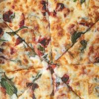 Supreme White 12 · White pizza with minced garlic, feta, sundried tomato, spinach and white Cheddar!