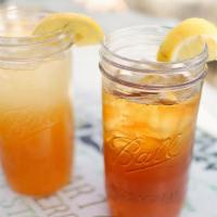 Arnold Palmer · A classic blend of fresh brewed iced tea and homemade lemonade, served in 16 oz.