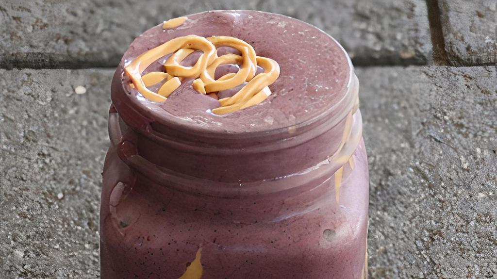 Pb Protein Shake · A blend of banana, organic acai, strawberries, blueberries, almond milk, protein powder and creamy peanut butter.