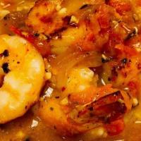 Shrimp N Grits · Southern, creamy topped with a white wine shrimp scampi; does not include two sides