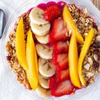 Dragon Fruit Bowl · Dragon fruit topped with fresh fruits and granola.