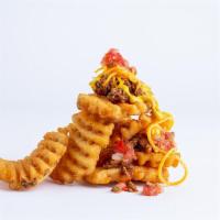 Loaded Waffle Fries · Waffle fries loaded with Pete's meat sauce, cheddar, pico and mustard