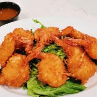 Crispy Coconut Shrimp (6) (New) · Crispy coconut battered butterfly shrimp on a bed of spring mix , glazed with sweet chili sa...