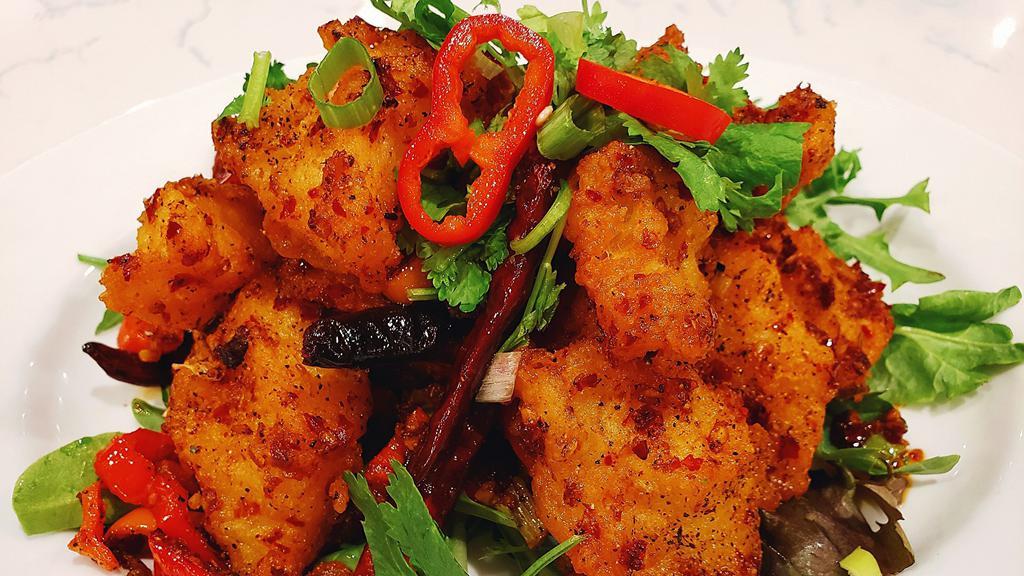 Sichuan Spiced Cod Fish (New) · Mild. Beer batted wild caught cod fish fillets deep fried to crispy tossed with serrano peppers, chili peppers, red bell peppers, onions , cilantro and five flavor seasoning