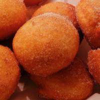 Chinese Donuts (10) · Warm donuts freshly fried to order and tossed with Saigon cinnamon and cane sugar.