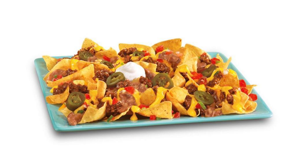 Beef Super Nachos · Seasoned ground beef, cheese sauce, salsa, jalapenos, refried beans and sour cream on top of chips. .