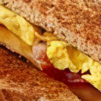 Breakfast Sandwich · breakfast sandwich w/ one egg on your choice of bread. add meats, cheeses, and veggies.