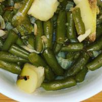 Green Beans · Slow cooked with smoky bacon and onions.