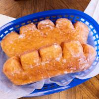 Bear Claws · Large pastry filled with cinnamon and topped with glaze.