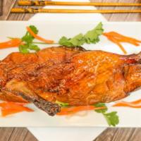 Half Roasted Duck · Bone-in roasted duck.